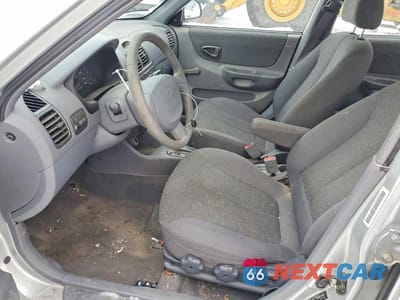 Zdjęcie 7 z 11 samochodu: 2002 HYUNDAI ACCENT GL VIN:KMHCG45C02U325127 - miniatura