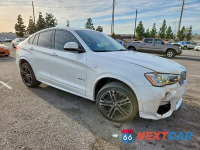 Czwarte zdjęcie samochodu z boku: 2016 BMW X4 XDRIVE28I VIN:5UXXW3C58G0R21879 - miniatura