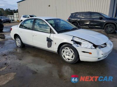 Czwarte zdjęcie samochodu z boku: 2001 SATURN SL2 VIN:1G8ZK527X1Z263791 - miniatura