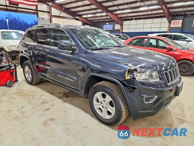 Czwarte zdjęcie samochodu z boku: 2015 JEEP GRAND CHEROKEE LAREDO VIN:1C4RJFAG2FC191351 - miniatura