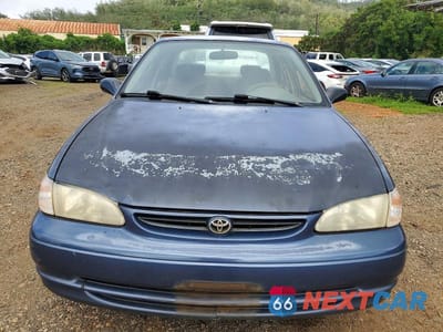 Piąte zdjęcie samochodu w środku: 2000 TOYOTA COROLLA VIN:1NXBR12E0YZ363315 - miniatura