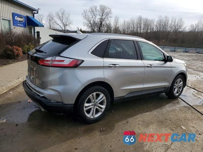 Trzecie zdjęcie samochodu z tyłu: 2020 FORD EDGE SEL VIN:2FMPK4J9XLBA60699 - miniatura