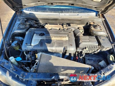 Zdjęcie 11 z 13 samochodu: 2003 HYUNDAI ELANTRA GLS VIN:KMHDN45D53U531094 - miniatura
