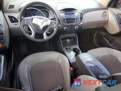Zdjęcie 8 z 12 samochodu: 2011 HYUNDAI TUCSON GLS VIN:KM8JU3AC0BU275507 - miniatura