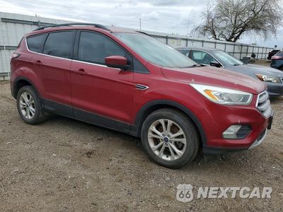 Czwarte zdjęcie samochodu z boku: 2017 FORD ESCAPE SE VIN:1FMCU0G93HUF07044 - miniatura