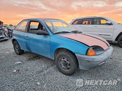 Czwarte zdjęcie samochodu z boku: 1997 GEO METRO VIN:2C1MR2265V6717333 - miniatura