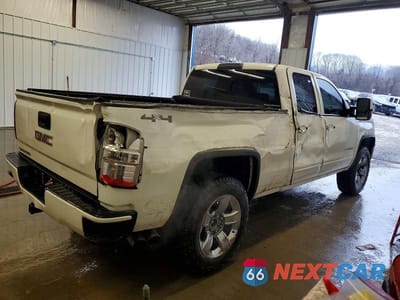 Trzecie zdjęcie samochodu z tyłu: 2015 GMC SIERRA K1500 VIN:1GTV2TEC6FZ387632 - miniatura