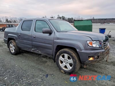 Czwarte zdjęcie samochodu z boku: 2014 HONDA RIDGELINE RTL VIN:5FPYK1F55EB002994 - miniatura