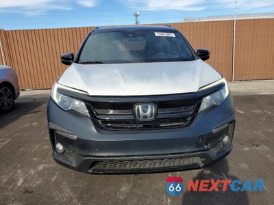 Piąte zdjęcie samochodu w środku: 2022 HONDA PILOT SPORT VIN:5FNYF5H38NB034497 - miniatura