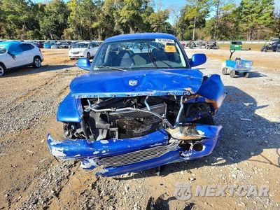 Piąte zdjęcie samochodu w środku: 2004 DODGE DAKOTA QUAD SLT VIN:1D7HL48N74S730960 - miniatura