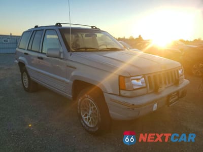 Czwarte zdjęcie samochodu z boku: 1995 JEEP GRAND CHEROKEE LIMITED VIN:1J4GZ78Y8SC516397 - miniatura
