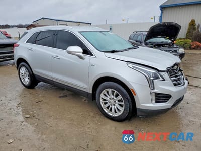 Czwarte zdjęcie samochodu z boku: 2019 CADILLAC XT5 VIN:1GYKNARS3KZ175663 - miniatura