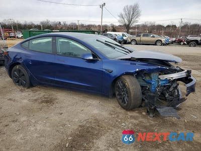 Czwarte zdjęcie samochodu z boku: 2024 TESLA MODEL 3 VIN:5YJ3E1EBXRF817196 - miniatura