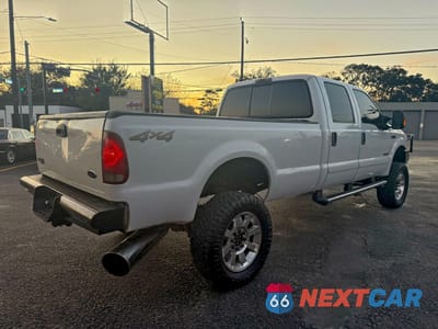Czwarte zdjęcie samochodu z boku: 2004 FORD F350 SRW SUPER DUTY VIN:1FTSW31P74ED34393 - miniatura