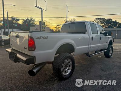 Czwarte zdjęcie samochodu z boku: 2004 FORD F350 SRW SUPER DUTY VIN:1FTSW31P74ED34393 - miniatura