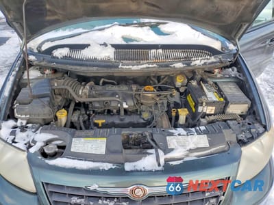 Zdjęcie 12 z 13 samochodu: 2003 CHRYSLER VOYAGER LX VIN:1C4GJ45303B115891 - miniatura