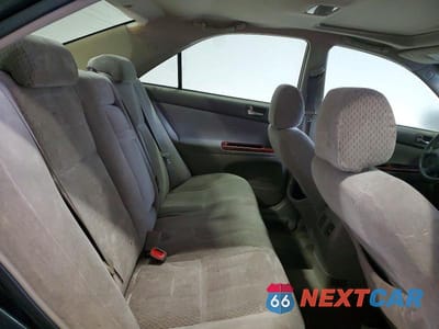 Zdjęcie 10 z 11 samochodu: 2004 TOYOTA CAMRY VIN:4T1BE30K94U295364 - miniatura