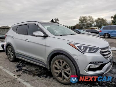 Czwarte zdjęcie samochodu z boku: 2018 HYUNDAI SANTA FE SPORT 2.0T ULTIMATE VIN:5XYZW4LA5JG522832 - miniatura