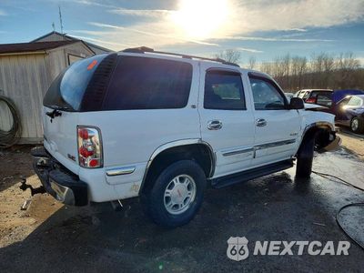 Trzecie zdjęcie samochodu z tyłu: 2001 GMC YUKON VIN:1GKEK13T31R184685 - miniatura