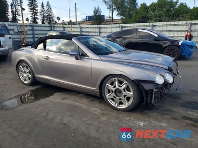 Czwarte zdjęcie samochodu z boku: 2009 BENTLEY CONTINENTAL GTC VIN:SCBDR33W59C060640 - miniatura