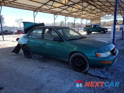 Czwarte zdjęcie samochodu z boku: 1997 TOYOTA COROLLA DX VIN:1NXBB02E2VZ505125 - miniatura