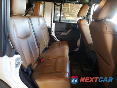 Zdjęcie 10 z 11 samochodu: 2013 JEEP WRANGLER UNLIMITED SAHARA VIN:1C4BJWEG5DL613413 - miniatura