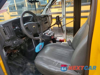 Piąte zdjęcie samochodu w środku: 2014 CHEVROLET EXPRESS SCHOOL BUS VIN:1GB0G2BA7E1160637 - miniatura
