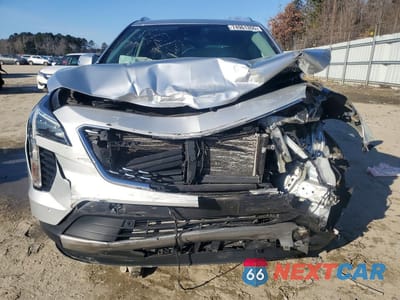 Piąte zdjęcie samochodu w środku: 2022 CADILLAC XT4 PREMIUM LUXURY VIN:1GYFZDR47NF131101 - miniatura