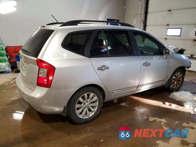 Trzecie zdjęcie samochodu z tyłu: 2010 KIA RONDO EX VIN:KNAHH8A8XA7327008 - miniatura