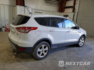 Trzecie zdjęcie samochodu z tyłu: 2014 FORD ESCAPE SE VIN:1FMCU9GX1EUD38124 - miniatura