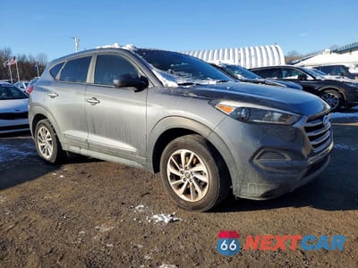 Czwarte zdjęcie samochodu z boku: 2018 HYUNDAI TUCSON SE VIN:KM8J23A43JU691080 - miniatura