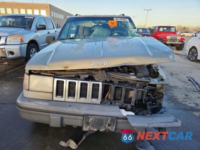 Piąte zdjęcie samochodu w środku: 1995 JEEP GRAND CHEROKEE LAREDO VIN:1J4GZ58S2SC571119 - miniatura