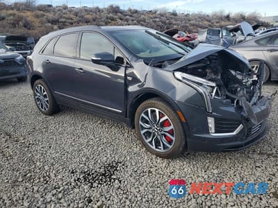 Czwarte zdjęcie samochodu z boku: 2022 CADILLAC XT5 SPORT VIN:1GYKNHRS2NZ100031 - miniatura