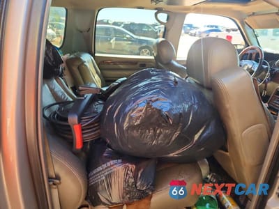 Zdjęcie 10 z 11 samochodu: 2004 CADILLAC ESCALADE ESV VIN:3GYFK66N34G198336 - miniatura