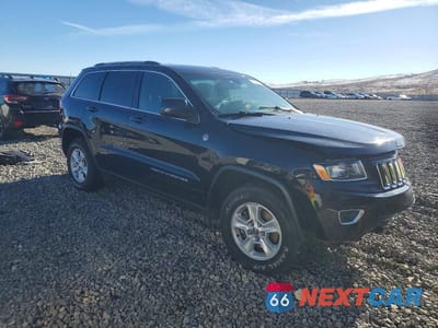 Czwarte zdjęcie samochodu z boku: 2015 JEEP GRAND CHEROKEE LAREDO VIN:1C4RJFAG1FC825278 - miniatura