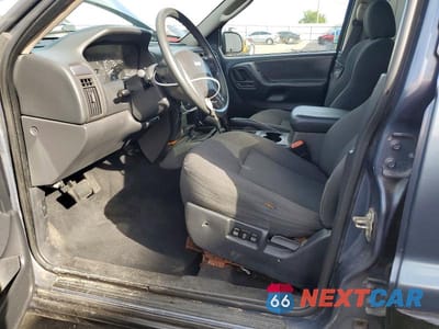 Zdjęcie 7 z 13 samochodu: 2004 JEEP GRAND CHEROKEE LAREDO VIN:1J4GW48S14C243812 - miniatura