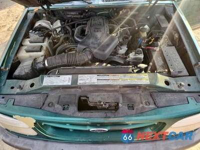 Zdjęcie 11 z 11 samochodu: 1999 FORD EXPLORER VIN:1FMYU24E8XUB41907 - miniatura