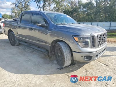 Czwarte zdjęcie samochodu z boku: 2019 NISSAN TITAN PLATINUM RESERVE VIN:1N6AA1E68KN533253 - miniatura