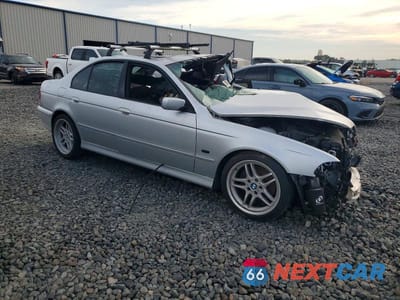 Czwarte zdjęcie samochodu z boku: 2002 BMW 540 I VIN:WBADN53452GF70049 - miniatura