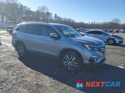 Czwarte zdjęcie samochodu z boku: 2017 HONDA PILOT TOURING VIN:5FNYF6H95HB006865 - miniatura