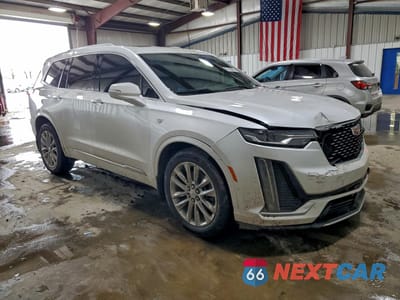 Czwarte zdjęcie samochodu z boku: 2023 CADILLAC XT6 PREMIUM LUXURY VIN:1GYKPDRS4PZ214392 - miniatura