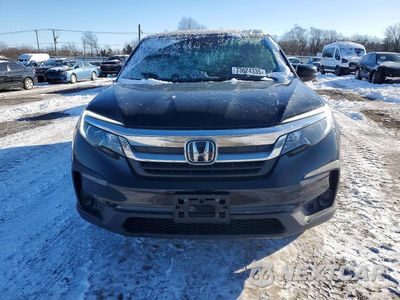 Piąte zdjęcie samochodu w środku: 2021 HONDA PILOT LX VIN:5FNYF6H13MB007064 - miniatura