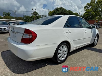 Czwarte zdjęcie samochodu z boku: 2002 TOYOTA CAMRY LE VIN:4T1BE32K52U027812 - miniatura