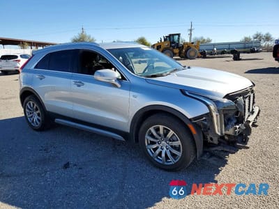 Czwarte zdjęcie samochodu z boku: 2022 CADILLAC XT4 PREMIUM LUXURY VIN:1GYFZCR44NF135309 - miniatura
