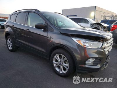 Czwarte zdjęcie samochodu z boku: 2018 FORD ESCAPE SE VIN:1FMCU0GD0JUD22069 - miniatura