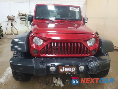 Piąte zdjęcie samochodu w środku: 2012 JEEP WRANGLER UNLIMITED SPORT VIN:1C4BJWDG0CL135448 - miniatura