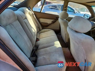 Zdjęcie 10 z 12 samochodu: 1994 TOYOTA CAMRY LE VIN:4T1SK12E7RU331032 - miniatura