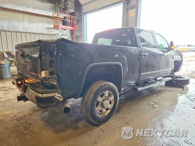 Trzecie zdjęcie samochodu z tyłu: 2019 GMC SIERRA K2500 SLT VIN:1GT12REY9KF238494 - miniatura