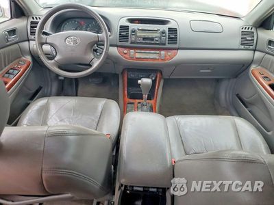 Zdjęcie 8 z 12 samochodu: 2003 TOYOTA CAMRY LE VIN:4T1BF30K63U037976 - miniatura