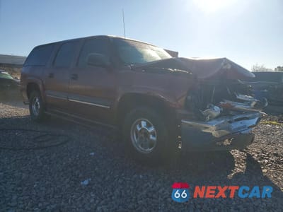 Czwarte zdjęcie samochodu z boku: 2002 CHEVROLET SUBURBAN C1500 VIN:1GNEC16Z62J250906 - miniatura